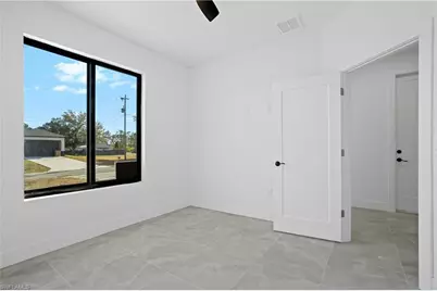 322 Loire Ave S, Lehigh Acres, FL 33974 - Photo 5