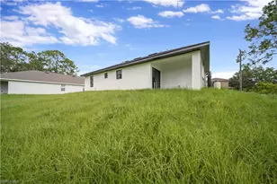 457 Woodman Dr, Lehigh Acres, FL 33972 - Photo 29