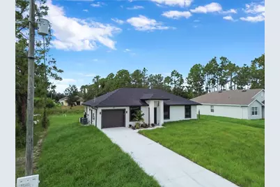 457 Woodman Dr, Lehigh Acres, FL 33972 - Photo 33