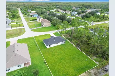457 Woodman Dr, Lehigh Acres, FL 33972 - Photo 39