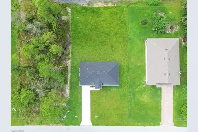 457 Woodman Dr, Lehigh Acres, FL 33972 - Photo 37