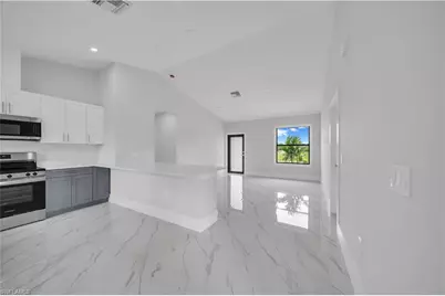 457 Woodman Dr, Lehigh Acres, FL 33972 - Photo 13