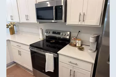 18421 Copperhead Ct N #215, Lehigh Acres, FL 33936 - Photo 5