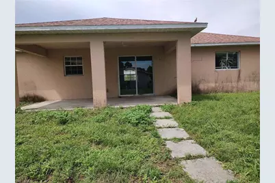 3125 74th St W, Lehigh Acres, FL 33971 - Photo 1
