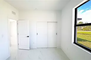 723 Bering Ave S, Lehigh Acres, FL 33974 - Photo 13