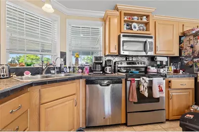 4826 Sandpiper Dr SW, Saint James City, FL 33956 - Photo 7