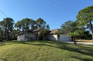 710 Nimitz Blvd, Lehigh Acres, FL 33974 - Photo 1