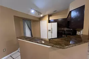 2411 Millie Ave S, Lehigh Acres, FL 33973 - Photo 5