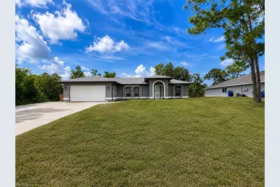 2411 Millie Ave S, Lehigh Acres, FL 33973 - Photo 1
