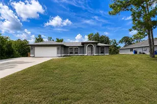 2411 Millie Ave S, Lehigh Acres, FL 33973 - Photo 1
