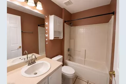 2411 Millie Ave S, Lehigh Acres, FL 33973 - Photo 9