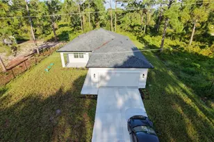 1030 Greenfield St, Lehigh Acres, FL 33974 - Photo 3