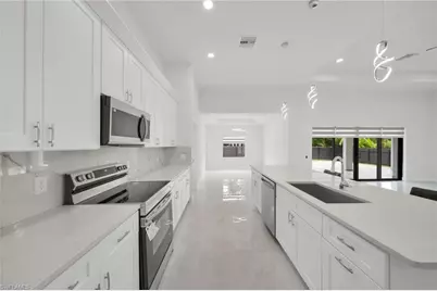 104 SW 34th Pl, Cape Coral, FL 33991 - Photo 9