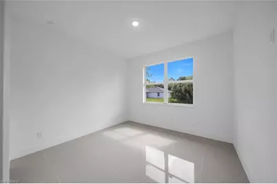 523 Harry Thayer Ave S, Lehigh Acres, FL 33974 - Photo 21