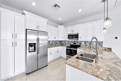 3417 16th St SW, Lehigh Acres, FL 33976 - Photo 7