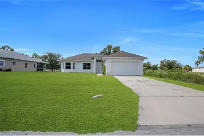 856 William Denver St, Lehigh Acres, FL 33974 - Photo 1