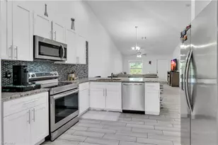 5063 Locke Ln, Lehigh Acres, FL 33973 - Photo 13