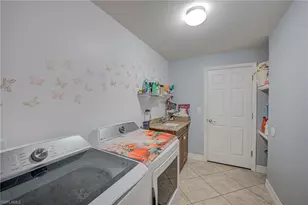 4910 Bygone St, Lehigh Acres, FL 33971 - Photo 27