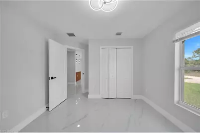 747 Fleming Ave S, Lehigh Acres, FL 33974 - Photo 5