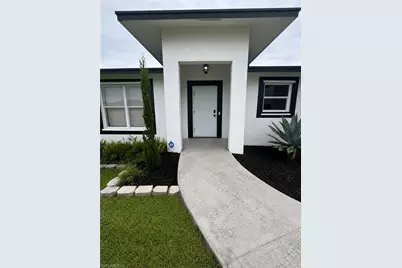 157 Dabou Loop, Belle Glade, FL 33430 - Photo 1