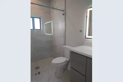 712 Theodore Vail St E, Lehigh Acres, FL 33974 - Photo 11