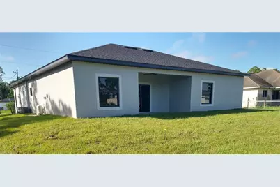 712 Theodore Vail St E, Lehigh Acres, FL 33974 - Photo 21