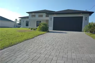 712 Theodore Vail St E, Lehigh Acres, FL 33974 - Photo 1