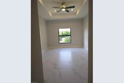 712 Theodore Vail St E, Lehigh Acres, FL 33974 - Photo 17