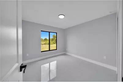 2706 30th St SW, Lehigh Acres, FL 33976 - Photo 23
