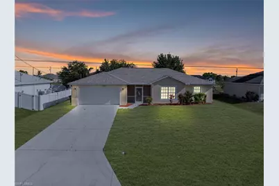 323 NW 10th St, Cape Coral, FL 33993 - Photo 1