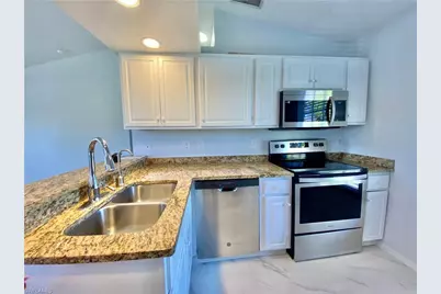 260 13th St SW, Naples, FL 34117 - Photo 37