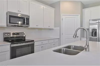20550 Hazelnut Ct S, Lehigh Acres, FL 33928 - Photo 11