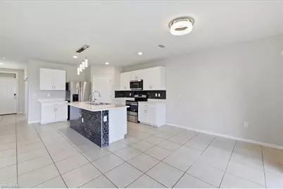 10601 Crossback Ln, Lehigh Acres, FL 33936 - Photo 11