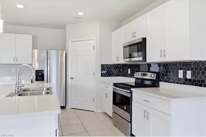 10601 Crossback Ln, Lehigh Acres, FL 33936 - Photo 7