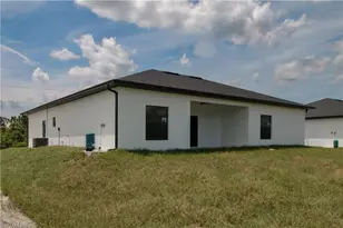 945 Commodore St, Lehigh Acres, FL 33974 - Photo 5