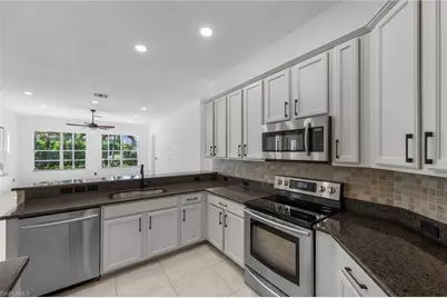 2628 Fairmont Cove Ct, Cape Coral, FL 33991 - Photo 17
