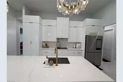 910 Venice Ave N, Lehigh Acres, FL 33971 - Photo 29