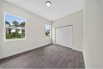 308 Mangonia Ave, Lehigh Acres, FL 33974 - Photo 19