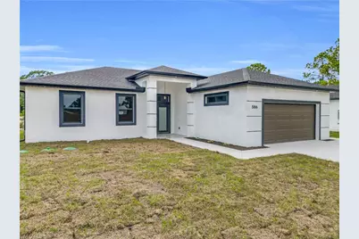586 Genoa Ave S, Lehigh Acres, FL 33974 - Photo 5