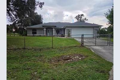 1025 Iris St E, Lehigh Acres, FL 33974 - Photo 1