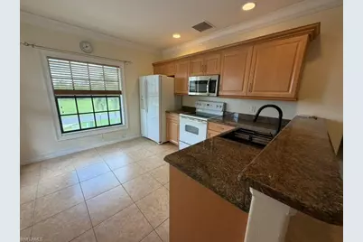 4921 SW 16th Pl #202, Cape Coral, FL 33914 - Photo 5