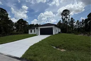1052 Grove St E, Lehigh Acres, FL 33974 - Photo 3