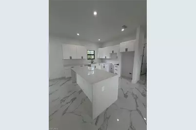 1052 Grove St E, Lehigh Acres, FL 33974 - Photo 5