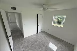 1002 Adams Ave, Lehigh Acres, FL 33936 - Photo 11