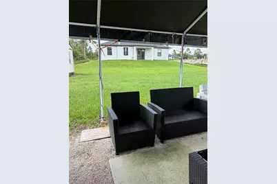 354 Mangonia Ave, Lehigh Acres, FL 33974 - Photo 17