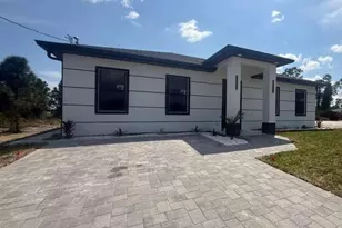 717 Devon St, Lehigh Acres, FL 33974 - Photo 1