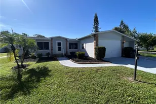 10561 Lake Loop Rd, North Fort Myers, FL 33903 - Photo 1