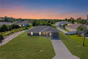 180 Peerless St, Lehigh Acres, FL 33974 - Photo 1