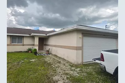 909 Eisenhower Blvd, Lehigh Acres, FL 33974 - Photo 1
