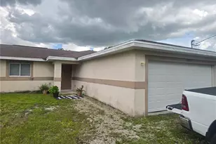 909 Eisenhower Blvd, Lehigh Acres, FL 33974 - Photo 1